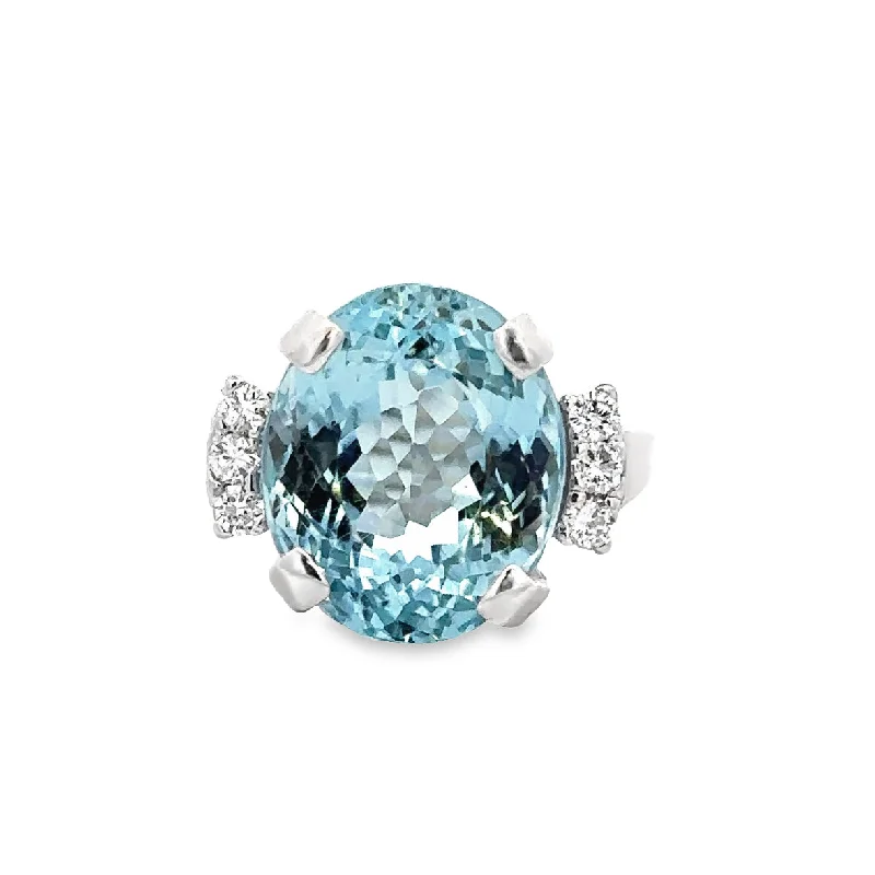 Blue Topaz and Diamond Ring in White Gold