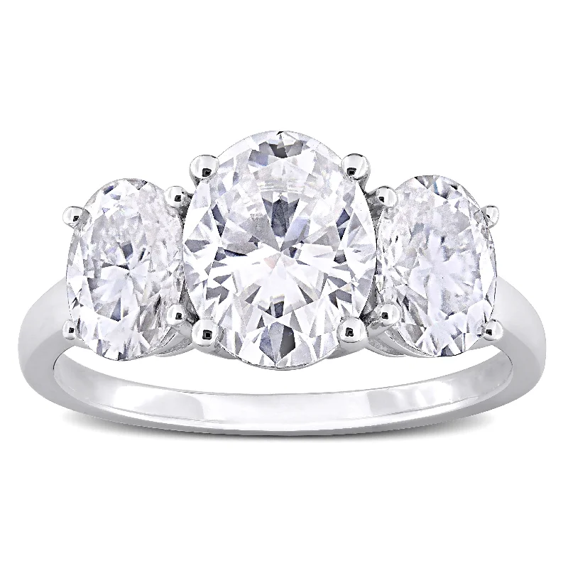 Miadora 4ct DEW Oval-cut Created Moissanite Three-Stone Engagement Ring in Sterling Silver