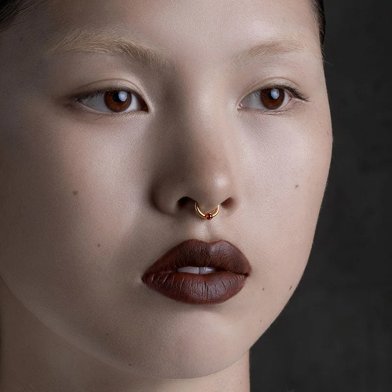 SERAPHINA. Garnet Septum Clicker Ring - Gold